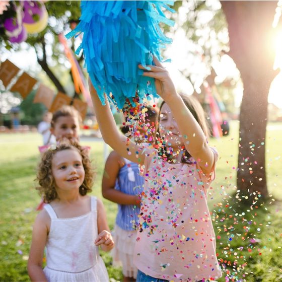 small-children-outdoors-in-garden-in-summer
